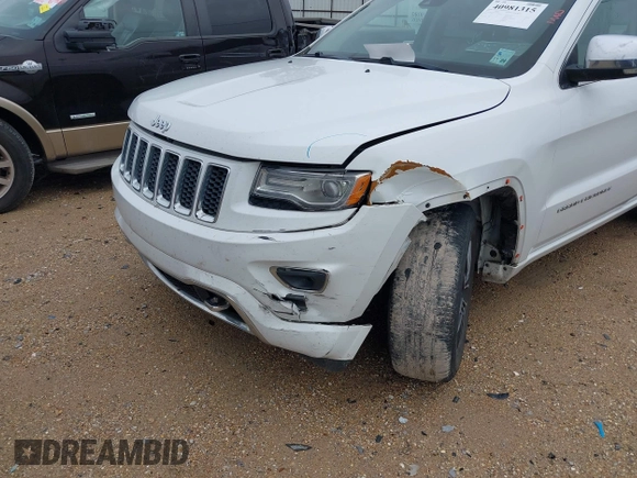 2014 Jeep Grand Cherokee Overland with VIN 1C4RJECG4EC543092, listed as a IAAI auction lot 40981315 with 149,096 mi miles. Bid and sale history available at carsss.com. Image 6.