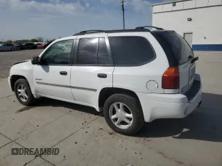 2006 GMC Envoy SLE z VIN 1GKDT13S462156541, wystawiony jako Copart lot #52500615 z przebiegiem 140 558 mil mil oraz Szkody całkowita. Historia ofert i sprzedaży dostępna na DreamBid. Obrazek 2.