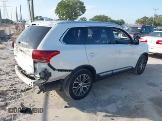 2017 Mitsubishi Outlander SE with VIN JA4AD3A36HZ032374, listed as a IAAI auction lot 42108810 with 89,034 mi miles and . Bid and sale history available at DreamBid. Image 4.