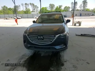2021 Mazda CX-9 Touring with VIN JM3TCACY7M0528188, listed as a Copart auction lot 53880865 with 63,581 mi miles and Salvage title. Bid and sale history available at DreamBid. Image 14.
