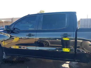 2021 Chevrolet Silverado 1500 LT Trail Boss with VIN 1GCPYFEL8MZ254411, listed as a IAAI auction lot 41313530 with 32,409 mi miles and . Bid and sale history available at DreamBid. Image 14.