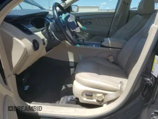 2014 Ford Taurus SEL z VIN 1FAHP2E81EG127398, wystawiony jako Copart lot #56666105 z przebiegiem 96 693 mil mil oraz Szkoda całkowita • Salvage title. Historia ofert i sprzedaży dostępna na DreamBid. Obrazek 7.