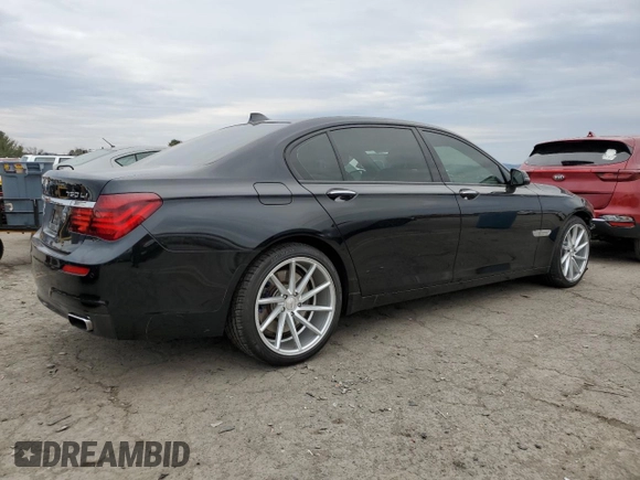2015 BMW 7 Series 750Li xDrive z VIN WBAYF8C54FD654795, wystawiony jako Copart lot #82381894 z przebiegiem 56 968 mil mil oraz Szkoda całkowita • Salvage title. Historia ofert i sprzedaży dostępna na DreamBid. Obrazek 3.