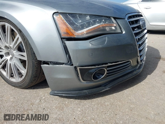 2011 Audi A8 with VIN WAUAVAFD5BN021080, listed as a IAAI auction lot 41223418 with 80,538 mi miles and . Bid and sale history available at DreamBid. Image 12.
