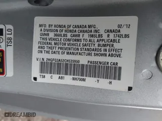 2012 Honda Civic Cpe LX with VIN 2HGFG3A52CH535950, listed as a IAAI auction lot 41496884 with 143,148 mi miles. Bid and sale history available at carsss.com. Image 9.