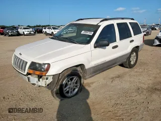 2004 Jeep Grand Cherokee Laredo z VIN 1J4GX48S24C427900, wystawiony jako Copart lot #59950785 z przebiegiem 293 247 mil mil oraz Szkoda całkowita • Salvage title. Historia ofert i sprzedaży dostępna na DreamBid. Obrazek 1.