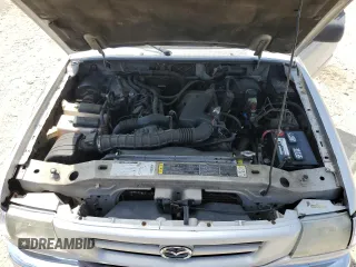 2002 Mazda B-Series Truck DS z VIN 4F4YR16U72TM03068, wystawiony jako Copart lot #55536395 z przebiegiem 199 895 mil mil oraz Czysty tytuł • Clean title. Historia ofert i sprzedaży dostępna na DreamBid. Obrazek 11.