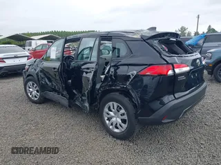 2023 Toyota Corolla Cross L with VIN 7MUAAABG3PV049367, listed as a IAAI auction lot 42370328 with 15,207 mi miles and . Bid and sale history available at DreamBid. Image 3.