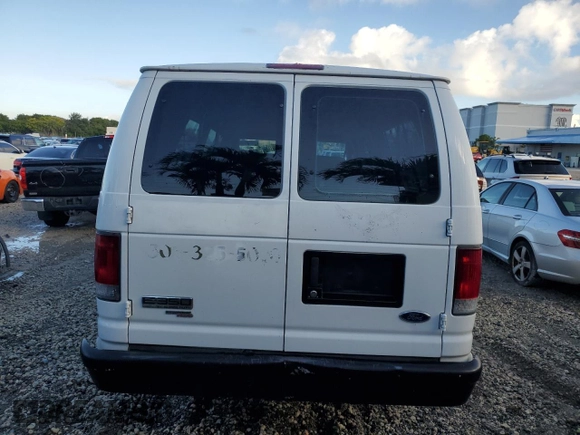 2008 Ford Econoline Passenger XL with VIN 1FBSS31L88DA78242, listed as a Copart auction lot 79951474 with 211,663 mi miles and Salvage Title. Bid and sale history available at DreamBid. Image 6.