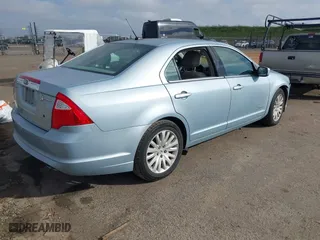 2011 Ford Fusion Hybrid with VIN 3FADP0L3XBR299914, listed as a IAAI auction lot 41659161 with 169,448 mi miles. Bid and sale history available at carsss.com. Image 4.