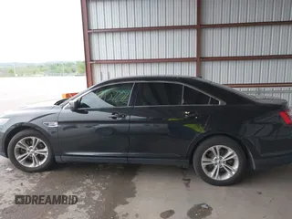2015 Ford Taurus SEL z VIN 1FAHP2E86FG165100, wystawiony jako IAAI lot #42157272 z przebiegiem 141 846 mil mil oraz . Historia ofert i sprzedaży dostępna na DreamBid. Obrazek 14.