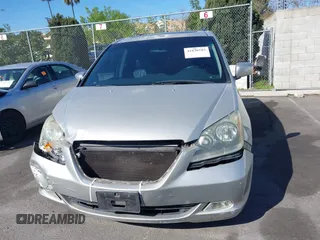 2005 Honda Odyssey TOURING with VIN 5FNRL38865B128519, listed as a IAAI auction lot 41830182 with 171,010 mi miles. Bid and sale history available at carsss.com. Image 13.