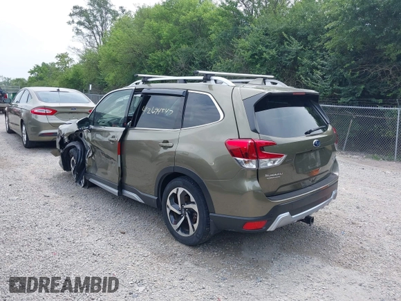 2023 Subaru Forester Touring with VIN JF2SKARC6PH400678, listed as a IAAI auction lot 42694547 with 14,484 mi miles and . Bid and sale history available at DreamBid. Image 3.