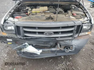 2002 Ford F-350 XL with VIN 1FTSF31F12EB21069, listed as a Copart auction lot 84287374 with 110,890 mi miles and Salvage Title. Bid and sale history available at DreamBid. Image 13.