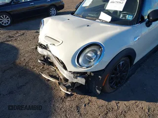 2020 MINI Hardtop Cooper S z VIN WMWXR5C00L2L49498, wystawiony jako IAAI lot #40679562 z przebiegiem 48 387 mil mil oraz . Historia ofert i sprzedaży dostępna na DreamBid. Obrazek 6.