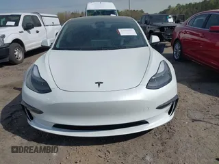 2022 Tesla Model 3 with VIN 5YJ3E1EA5NF124148, listed as a IAAI auction lot 41908884 with 45,115 mi miles. Bid and sale history available at carsss.com. Image 13.