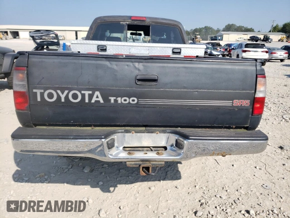1997 Toyota T100 SR5 with VIN JT4UN24D8V0043620, listed as a Copart auction lot 86747534 with 185,470 mi miles and Salvage Title. Bid and sale history available at DreamBid. Image 6.