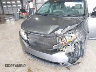 2011 Honda Odyssey Touring с VIN 5FNRL5H90BB025855, выставлен на аукционе IAAI как лот 42104979 с пробегом 165 010 миль миль и . История ставок и продаж доступна на DreamBid. Изображение 6.