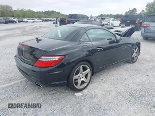 2014 Mercedes-Benz SLK 250 with VIN WDDPK4HA4EF079437, listed as a IAAI auction lot 41958020 with 95,063 mi miles and . Bid and sale history available at DreamBid. Image 4.