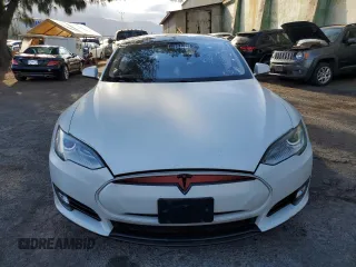 2013 Tesla Model S with VIN 5YJSA1AC8DFP10890, listed as a Copart auction lot 60735174 with 51,847 mi miles and Clean Title. Bid and sale history available at DreamBid. Image 5.