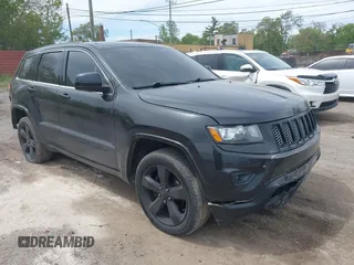 2015 Jeep Grand Cherokee Altitude z VIN 1C4RJFAG5FC682058, wystawiony jako IAAI lot #42352814 z przebiegiem 228 067 mil mil oraz . Historia ofert i sprzedaży dostępna na DreamBid. Obrazek 1.