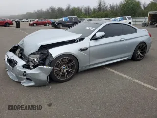 2013 BMW M6 z VIN WBSLX9C54DC968720, wystawiony jako Copart lot #59848565 z przebiegiem 73 814 mil mil oraz Szkoda całkowita • Salvage title. Historia ofert i sprzedaży dostępna na DreamBid. Obrazek 1.