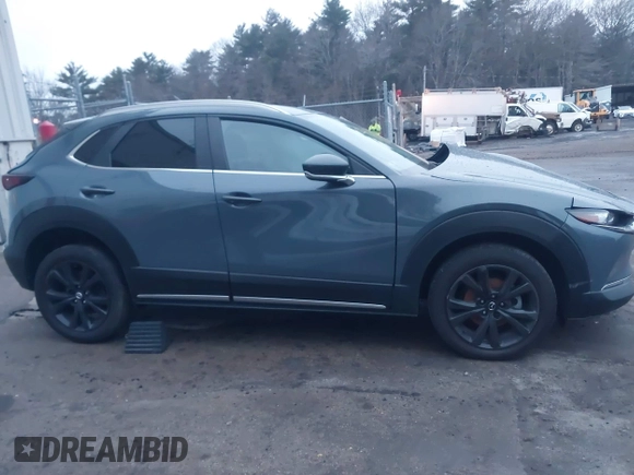 2023 Mazda CX-30 S Carbon Edition with VIN 3MVDMBCM5PM545150, listed as a IAAI auction lot 41104881 with 30,459 mi miles and . Bid and sale history available at DreamBid. Image 13.