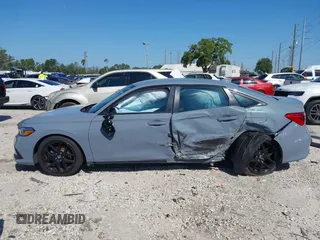 2024 Honda Civic Sport z VIN 2HGFE2F57RH580545, wystawiony jako IAAI lot #41962091 z przebiegiem 9 793 mil mil oraz . Historia ofert i sprzedaży dostępna na DreamBid. Obrazek 14.
