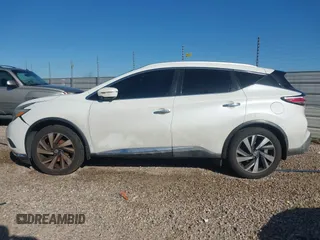 2015 Nissan Murano Platinum z VIN 5N1AZ2MG7FN265552, wystawiony jako IAAI lot #41828490 z przebiegiem 211 465 mil mil oraz . Historia ofert i sprzedaży dostępna na DreamBid. Obrazek 14.