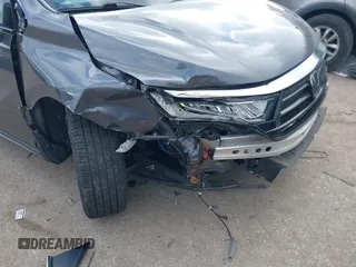 2022 Honda Odyssey Touring with VIN 5FNRL6H80NB023623, listed as a IAAI auction lot 41512586 with 63,329 mi miles and . Bid and sale history available at DreamBid. Image 6.