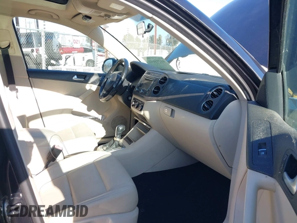 2012 Volkswagen Tiguan S with VIN WVGBV7AX4CW607546, listed as a IAAI auction lot 41295646 with 115,670 mi miles and . Bid and sale history available at DreamBid. Image 5.