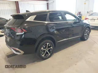 2023 Kia Sportage EX with VIN KNDPVCAG8P7095454, listed as a IAAI auction lot 42335661 with 96,718 mi miles and . Bid and sale history available at DreamBid. Image 4.