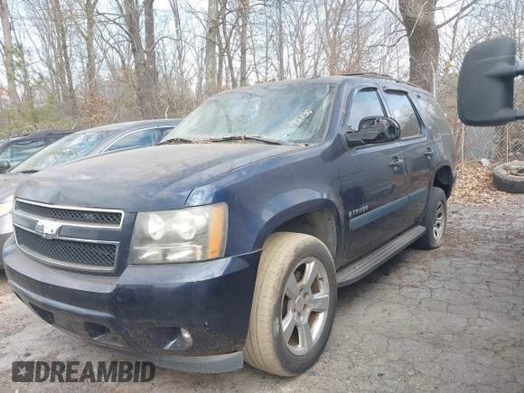 2007 Chevrolet Tahoe LTZ with VIN 1GNFC13J37R145736, listed as a IAAI auction lot 41724845 with 290,931 mi miles and . Bid and sale history available at DreamBid. Image 2.