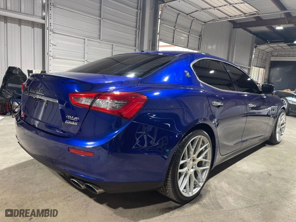 2014 Maserati Ghibli S Q4 with VIN ZAM57RTA0E1087454, listed as a Copart auction lot 84060514 with NaN miles and Salvage Title. Bid and sale history available at carsss.com. Image 4.