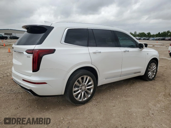 2021 Cadillac XT6 Premium Luxury with VIN 1GYKPCRSXMZ169206, listed as a Copart auction lot 55953525 with 64,789 mi miles and Salvage Title. Bid and sale history available at DreamBid. Image 3.