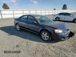 2006 Dodge Stratus SXT z VIN 1B3EL46R46N185788, wystawiony jako Copart lot #71580104 z przebiegiem 104 390 mil mil oraz Szkoda całkowita • Salvage title. Historia ofert i sprzedaży dostępna na DreamBid. Obrazek 11.