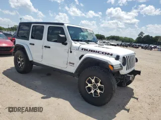 2020 Jeep Wrangler Unlimited Rubicon with VIN 1C4HJXFG3LW184249, listed as a Copart auction lot 56423665 with 63,111 mi miles and Salvage title. Bid and sale history available at DreamBid. Image 4.