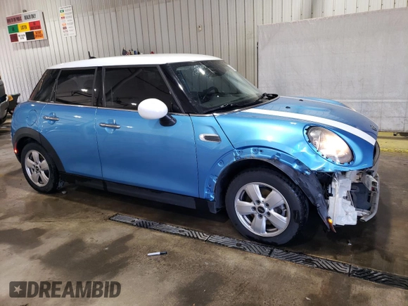 2017 MINI Hardtop 4 Door Cooper with VIN WMWXU1C58H2E17768, listed as a Copart auction lot 55128445 with 114,957 mi miles and Salvage Title. Bid and sale history available at DreamBid. Image 4.