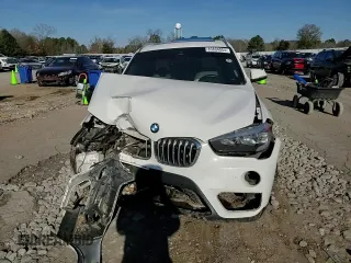 2019 BMW X1 sDrive28i with VIN WBXHU7C53K3H45694, listed as a Copart auction lot 85804084 with 151,645 mi miles and Salvage Title. Bid and sale history available at DreamBid. Image 11.