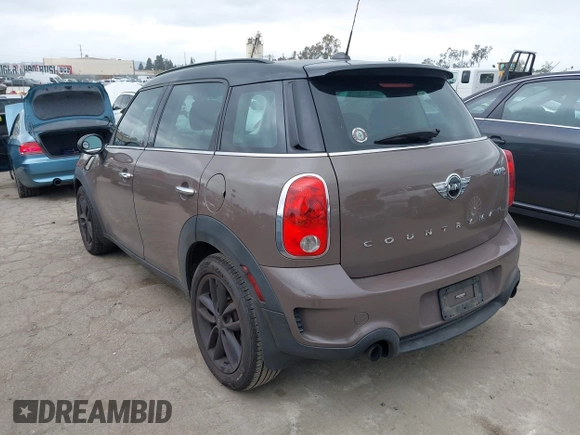 2015 MINI Countryman S z VIN WMWZC3C53FWT02232, wystawiony jako IAAI lot #42204694 z przebiegiem 107 544 mil mil oraz . Historia ofert i sprzedaży dostępna na DreamBid. Obrazek 3.