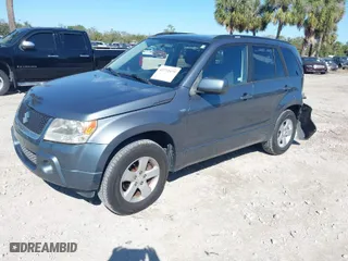 2006 Suzuki Grand Vitara Premium with VIN JS3TD943064100693, listed as a IAAI auction lot 41772479 with 135,901 mi miles. Bid and sale history available at carsss.com. Image 2.