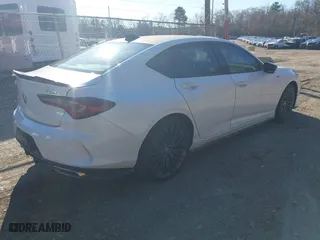 2022 Acura TLX w/A-Spec Package with VIN 19UUB5F52NA005022, listed as a IAAI auction lot 40977803 with 9,665 mi miles. Bid and sale history available at carsss.com. Image 4.