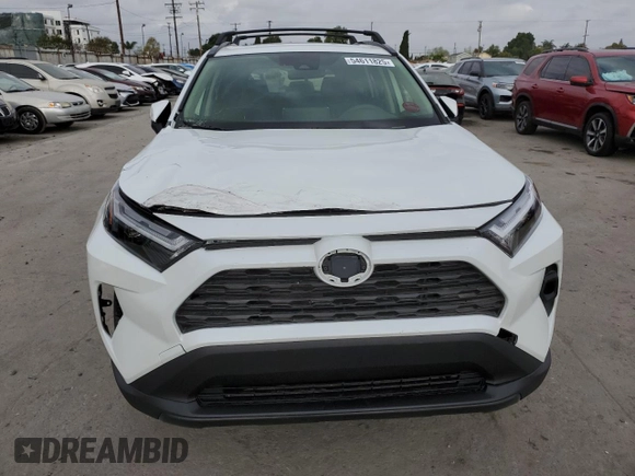 2024 Toyota RAV4 Hybrid XLE Premium with VIN JTMB6RFV3RJ059534, listed as a Copart auction lot 54611825 with 6,319 mi miles and Salvage Title. Bid and sale history available at carsss.com. Image 5.