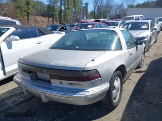 1989 Buick Reatta with VIN 1G4EC11C7KB905060, listed as a IAAI auction lot 41766446 with 82,489 mi miles. Bid and sale history available at carsss.com. Image 4.