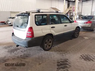 2003 Subaru Forester X with VIN JF1SG63653H762212, listed as a IAAI auction lot 41841892 with 152,059 mi miles. Bid and sale history available at carsss.com. Image 4.