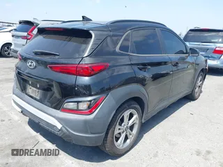 2022 Hyundai Kona SEL with VIN KM8K32ABXNU771167, listed as a IAAI auction lot 42380159 with 107,838 mi miles and . Bid and sale history available at DreamBid. Image 4.