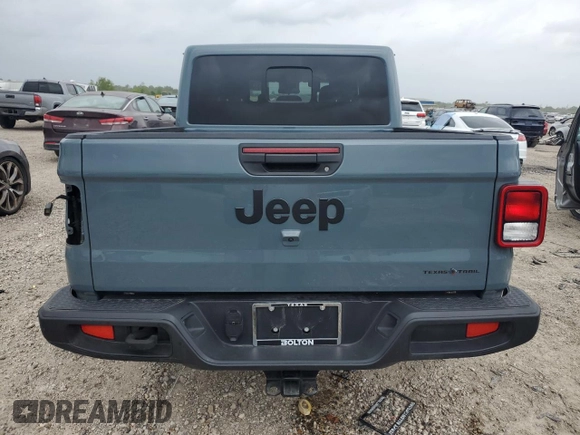 2024 Jeep Gladiator Sport S с VIN 1C6HJTAG1RL131910, выставлен на аукционе Copart как лот 51380125 с пробегом 23 060 миль миль и Списание • Salvage title. История ставок и продаж доступна на DreamBid. Изображение 6.