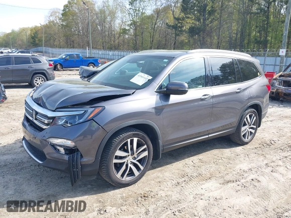 2017 Honda Pilot Touring with VIN 5FNYF5H9XHB046479, listed as a IAAI auction lot 41941449 with 162,554 mi miles. Bid and sale history available at carsss.com. Image 17.