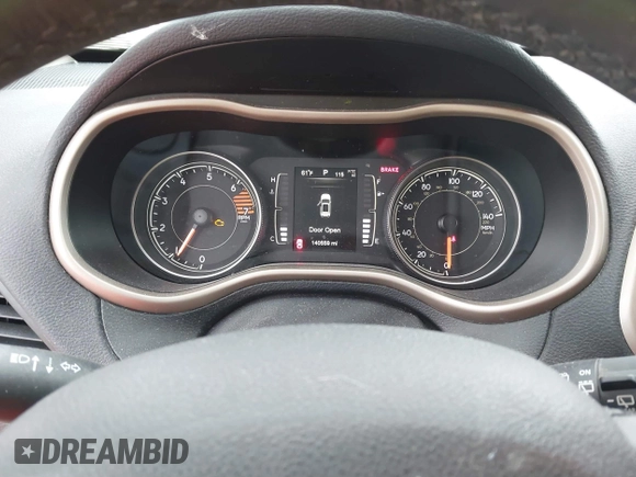 2016 Jeep Cherokee Latitude z VIN 1C4PJMCB9GW152673, wystawiony jako IAAI lot #41704412 z przebiegiem 140 559 mil mil oraz . Historia ofert i sprzedaży dostępna na DreamBid. Obrazek 7.