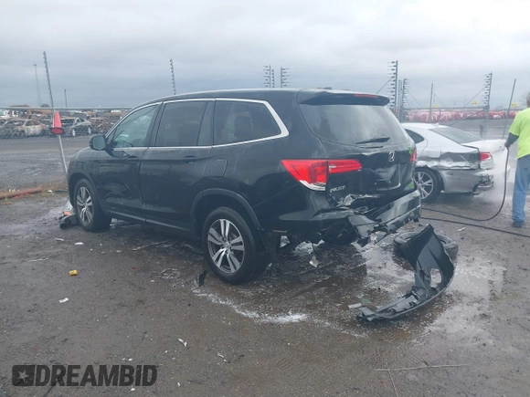 2016 Honda Pilot EX-L with VIN 5FNYF5H56GB031831, listed as a IAAI auction lot 41111342 with 244,197 mi miles and . Bid and sale history available at DreamBid. Image 3.
